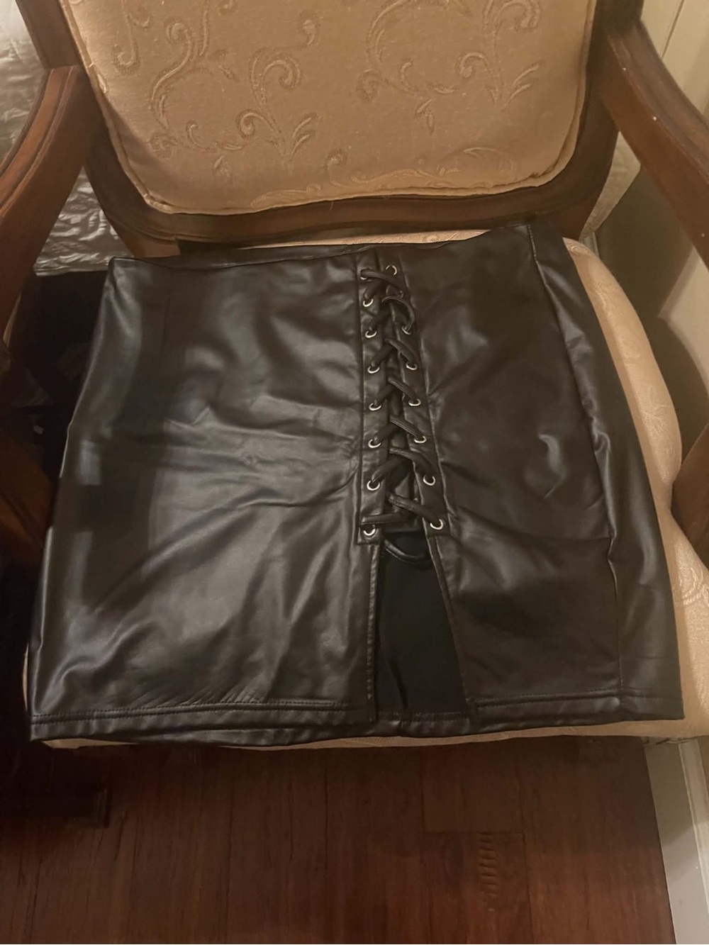 Sleek Black Faux Leather Lace-Up Mini Skirt
